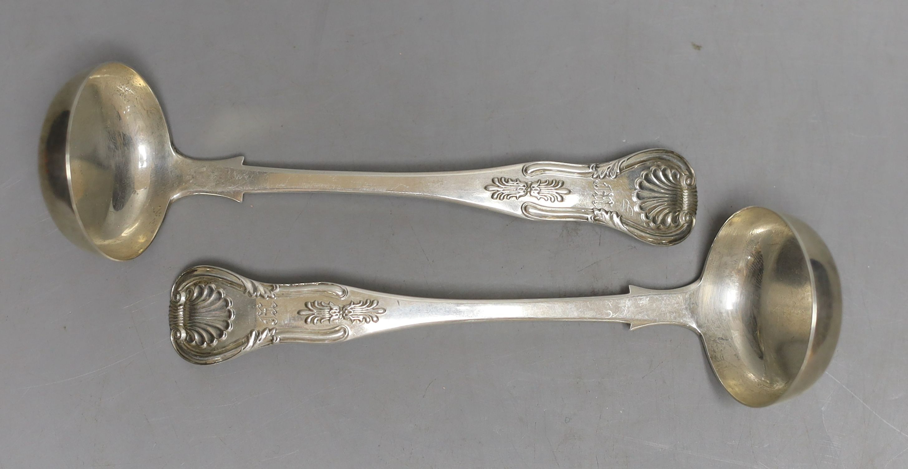 A pair of Victorian Scottish silver Kings pattern sauce ladles, by Marshall & Sons, Glasgow, 1855, 14.5cm, 72 grams.